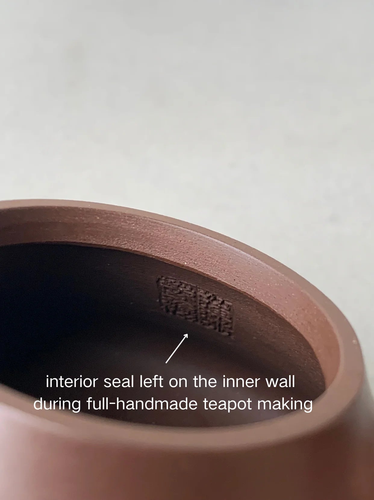 interior seal left on the inner wall during full-handmade teapot making