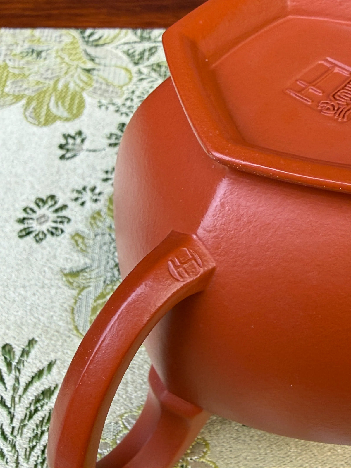 potter Wang Tao’s mark on the handle of the teapot.