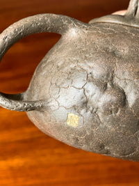 The body of the teapot bears the artist Fan's seal