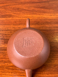 there are two two teapot marks from teapot master wei ren on the bottom