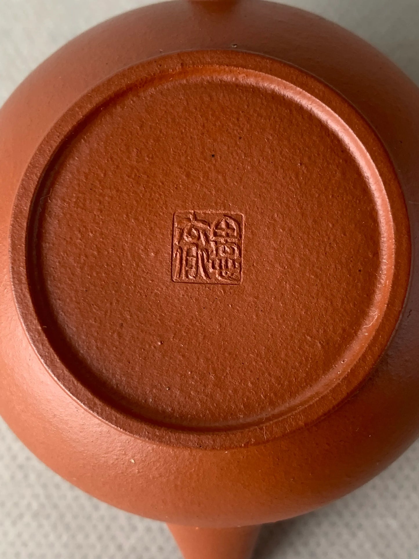 the teapot mark "si xin zhai" of the small yixing teapot