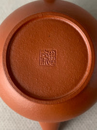 the teapot mark "si xin zhai" of the small yixing teapot