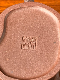the teapot mark of wu hongkang on the teapot bottom