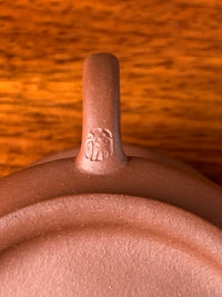 the teapot mark on the teapot handle
