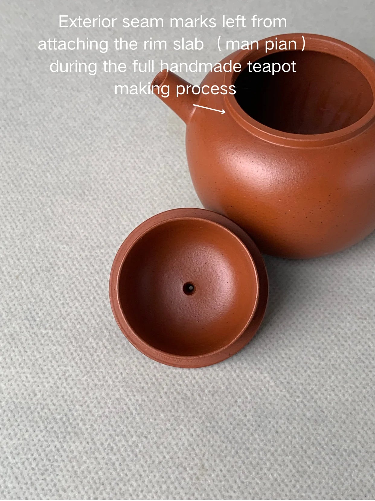 Exterior seam marks left from attaching the rim slab （man pian）during the full handmade teapot making process