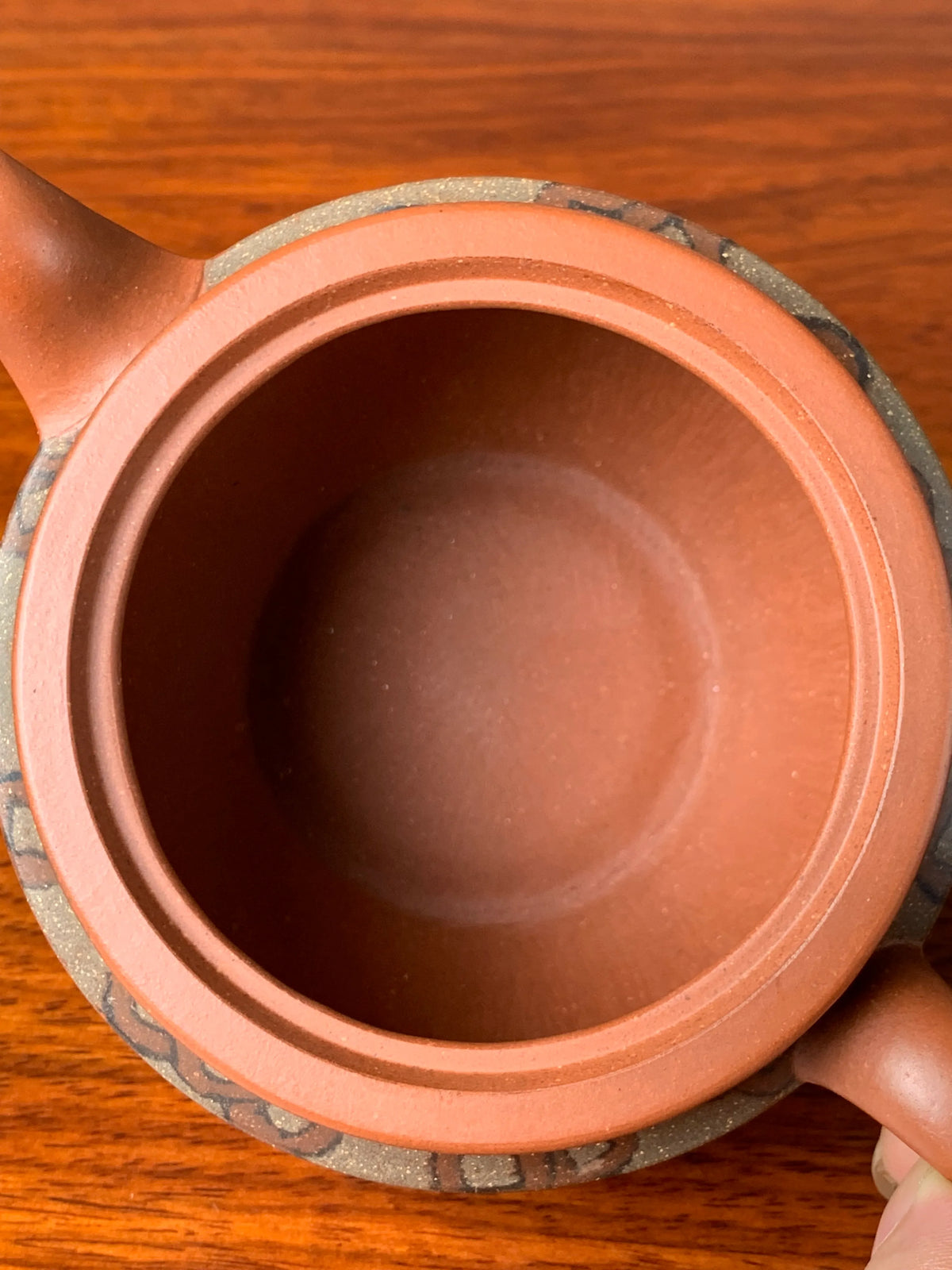 the mouth of the yixing zisha clay teapot 
