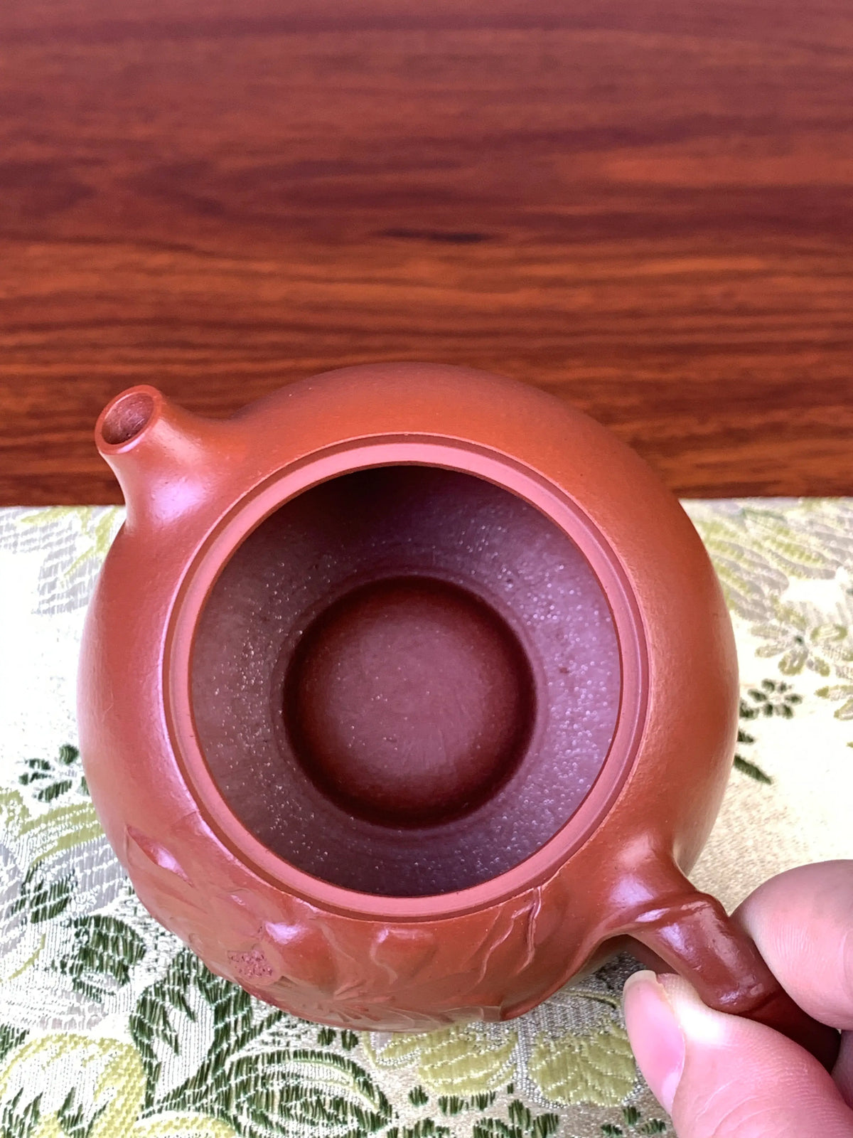 the mouth of the handmade yixing teapot xi shi