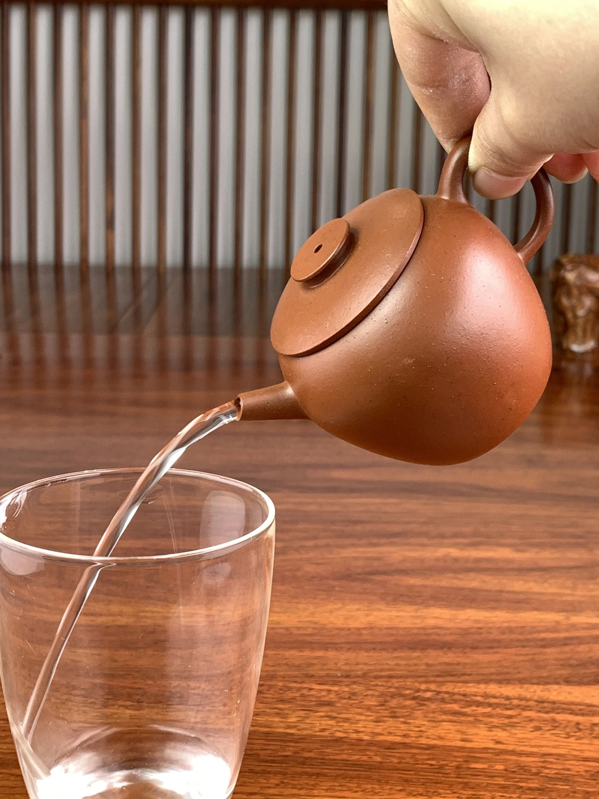 good pour of yixing teapot handmade with Zisha clay