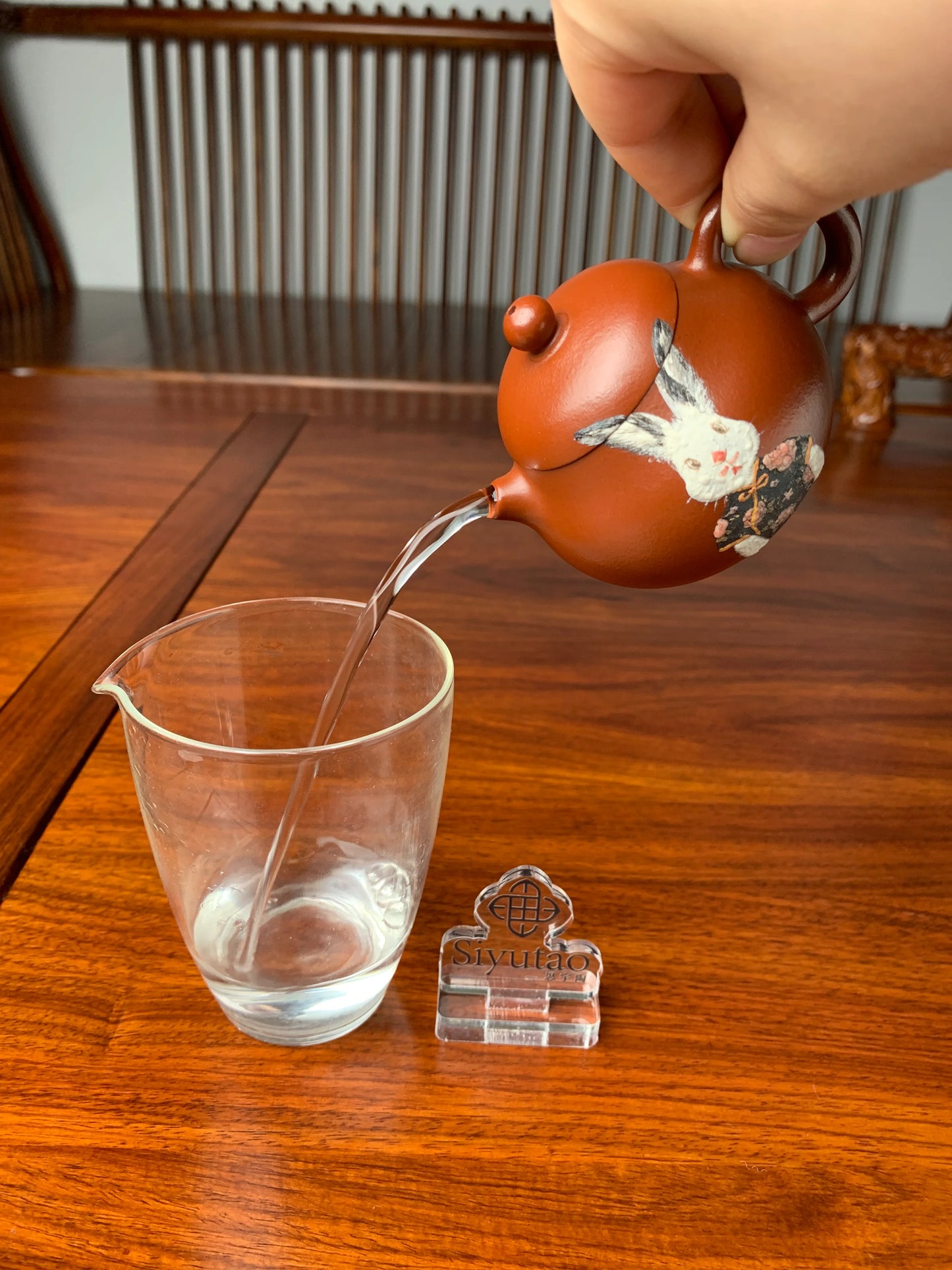 the perfect pour of the yixing teapot artwork
