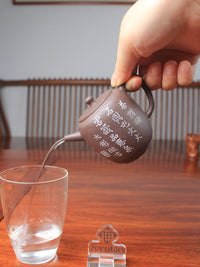 the pour of the handmade yixing teapot is excellent