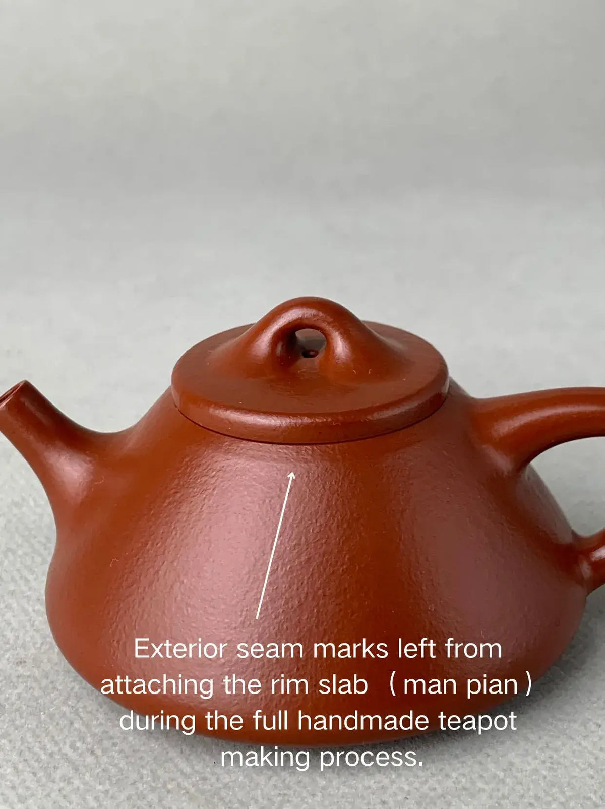 the front view of the yixing teapot zisha shi piao