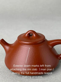 the front view of the yixing teapot zisha shi piao