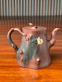 the back view of the yixing teapot zisha pine tree