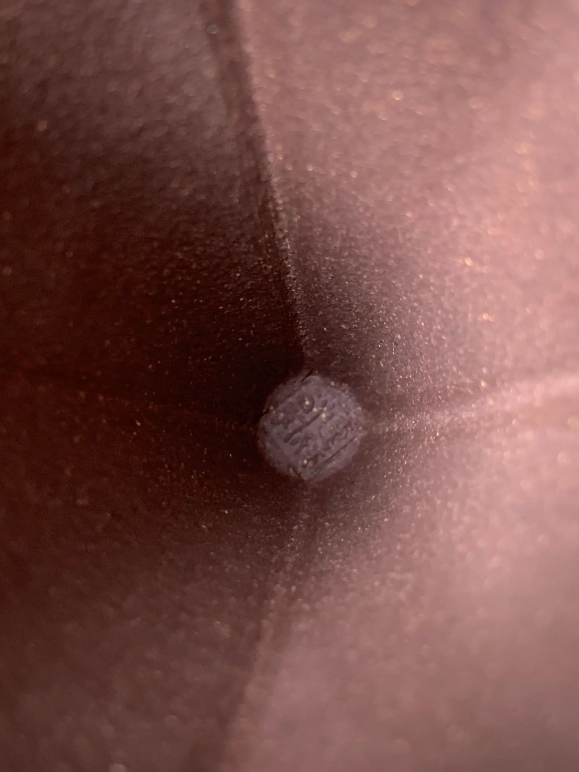 Detail of the artist's seal on the interior of the flared vintage teacup