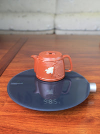 Weight of the Vintage teapot handmade with yixing clay by teapot artist 