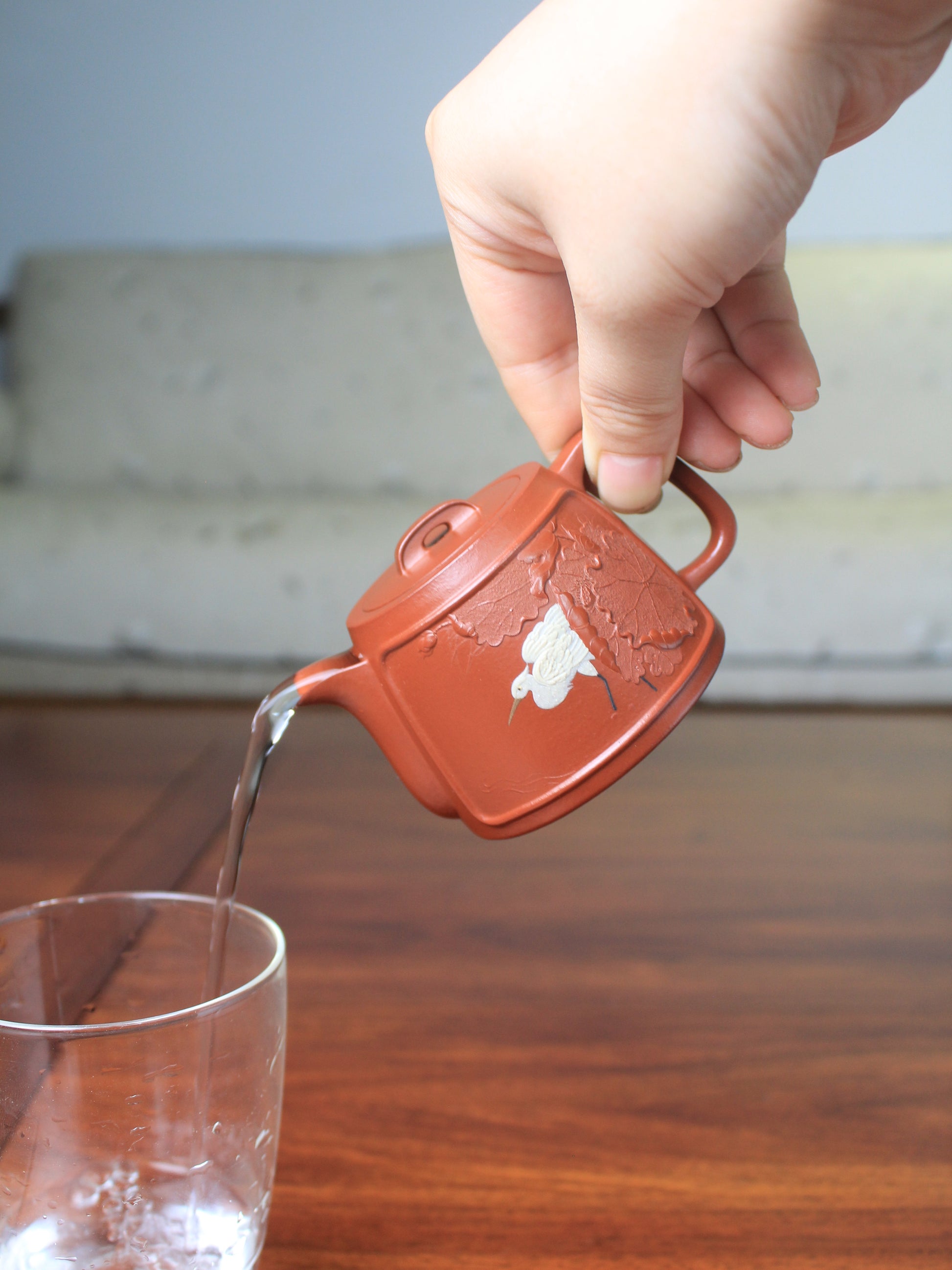 pour of Vintage teapot handmade with yixing clay by teapot artist 