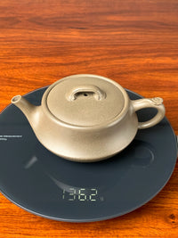 the weight of the teapot artwork ru yi is 136g
