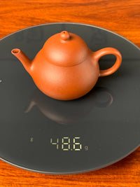 the weight of the small yixing teapot li xing is 48.6g