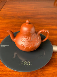 the weight of the handmade zisha teapot is 128g