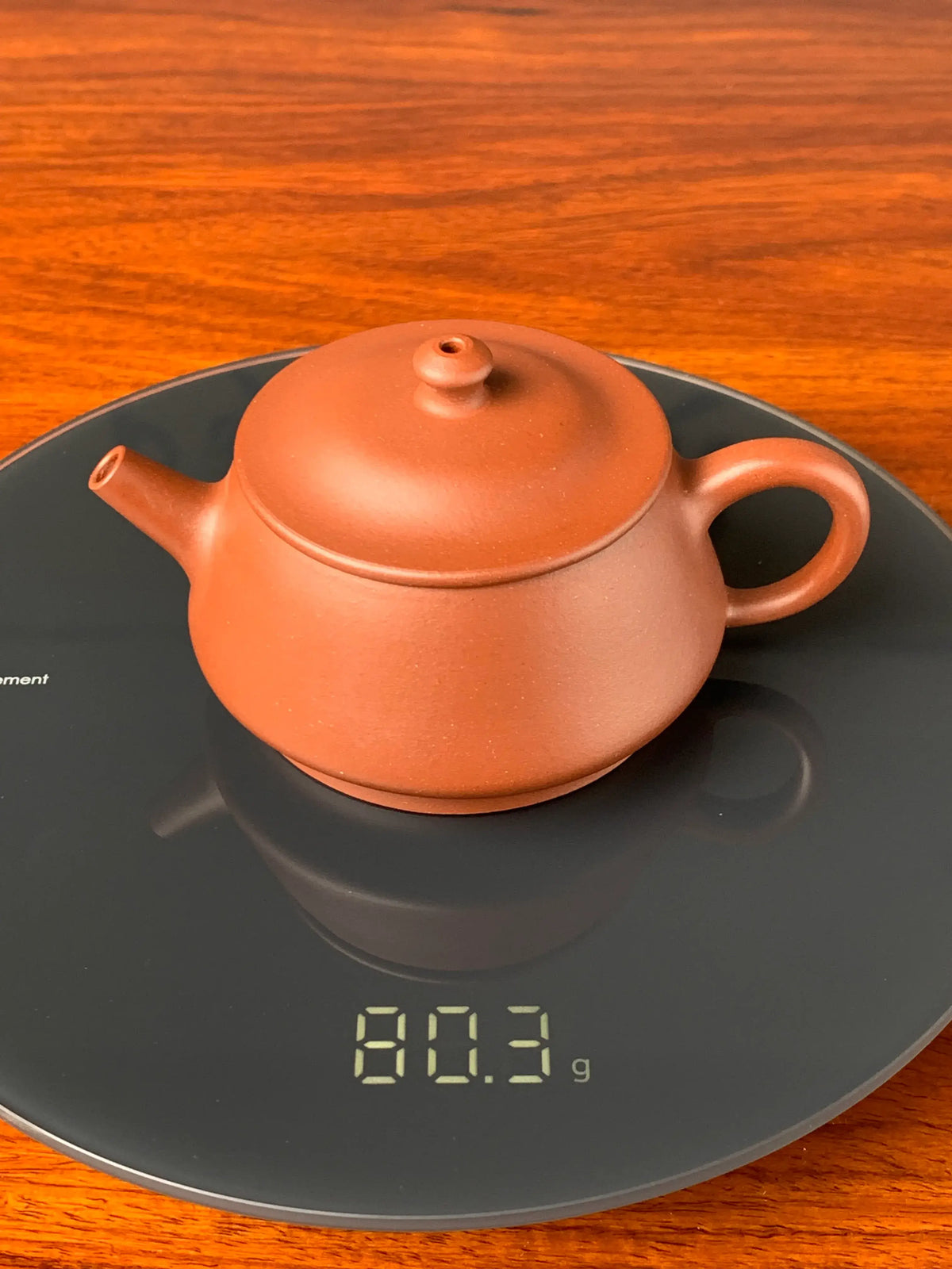 the weight of the small yixing teapot is 80.3g