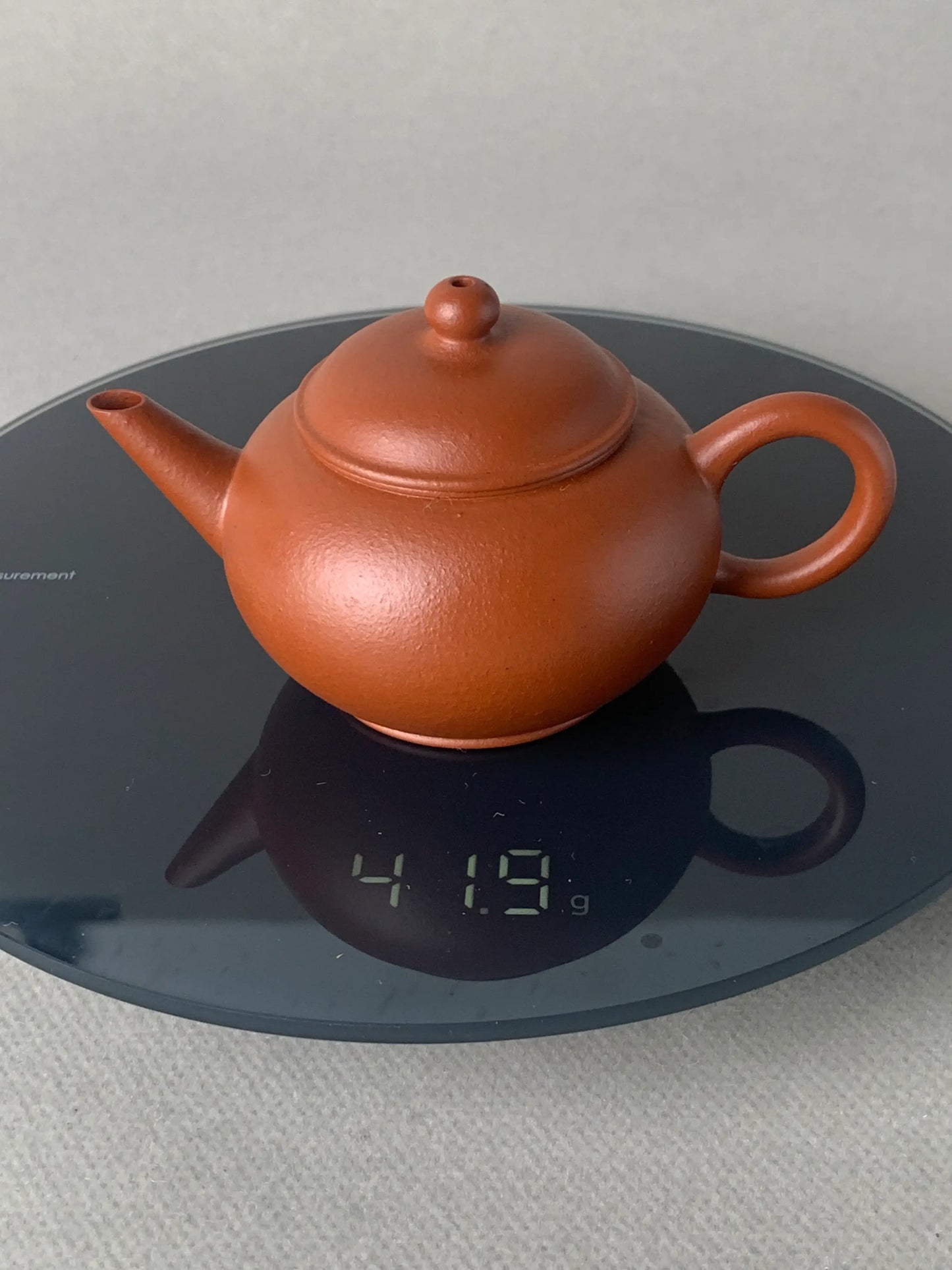 the weight of the small yixing teapot is 41.9g