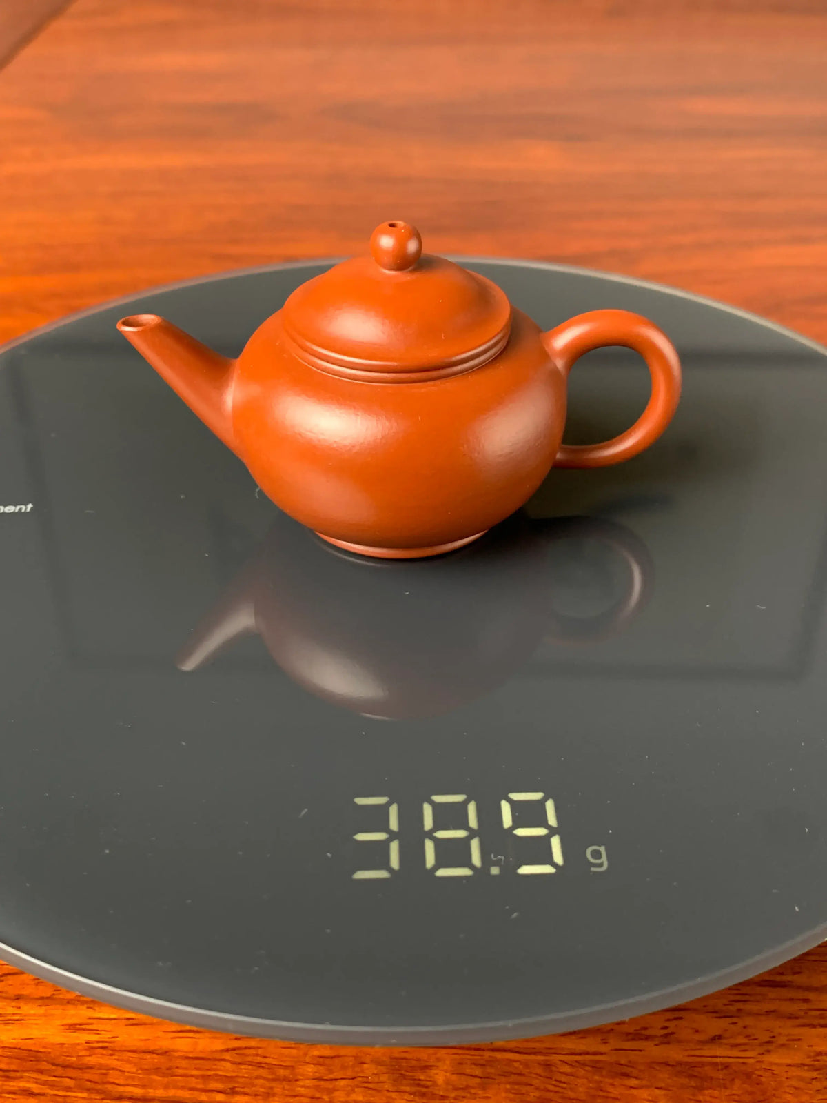 the weight of the small yixing teapot shui ping is 38.9g
