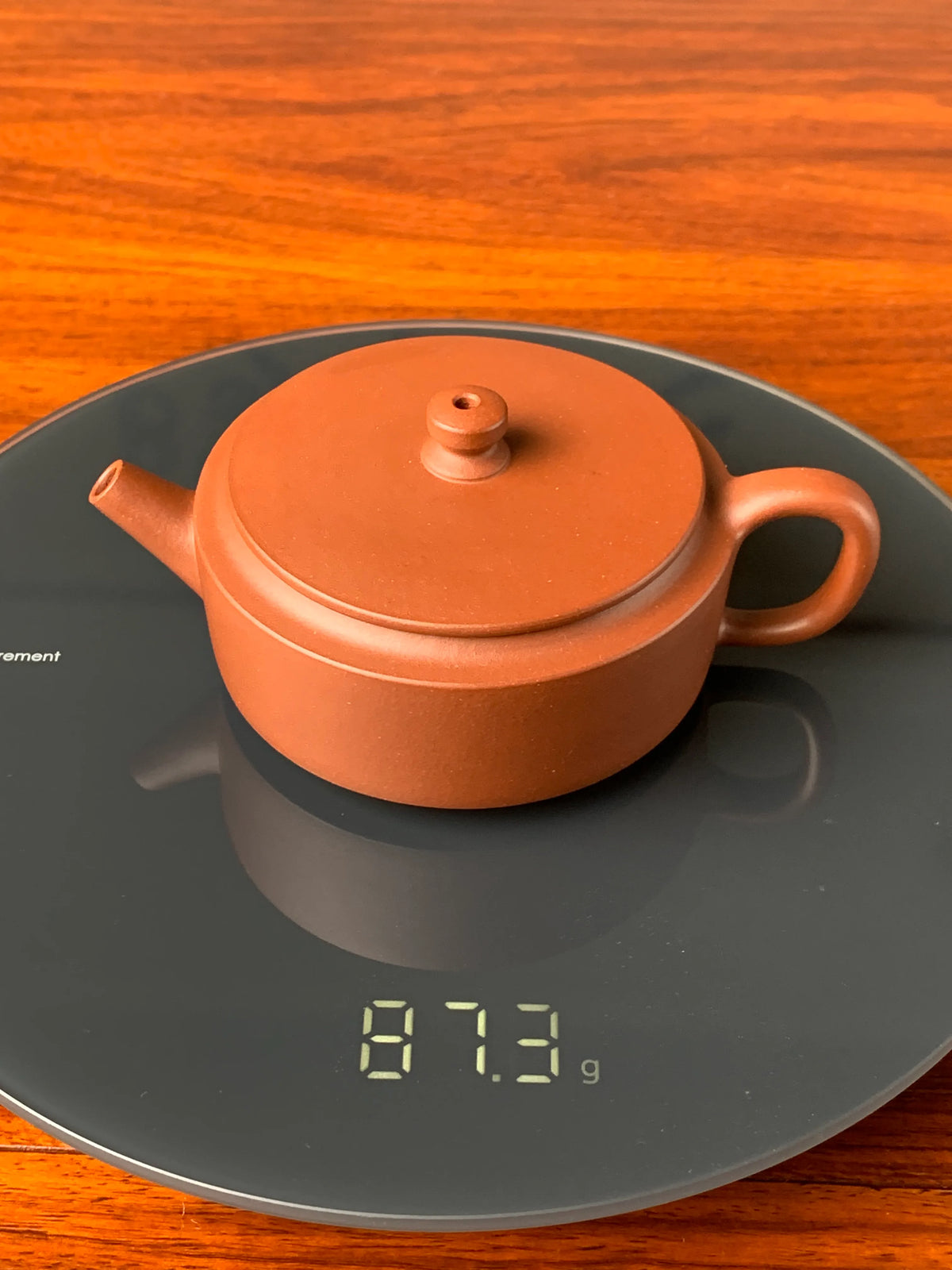 the weight of the small yixing teapot is 87.3g