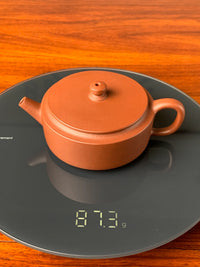 the weight of the small yixing teapot is 87.3g