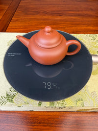 the weight of the small yixing teapot is 79g