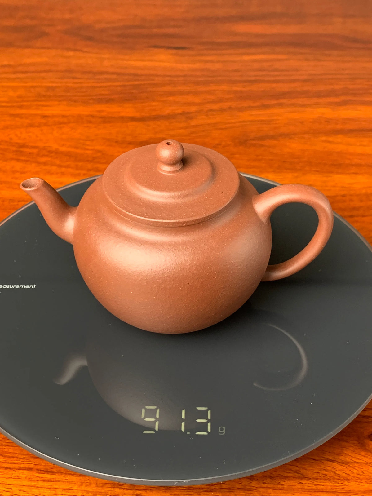 the weight of the handmade yixing teapot is 91g