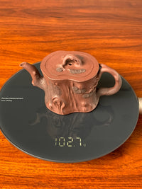 the weight of the beautiful teapot is 102.7g
