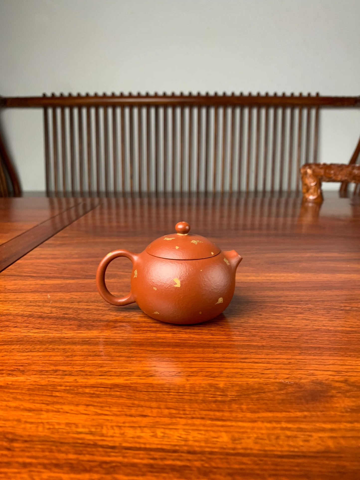 xishi yixing teapot on the table back view