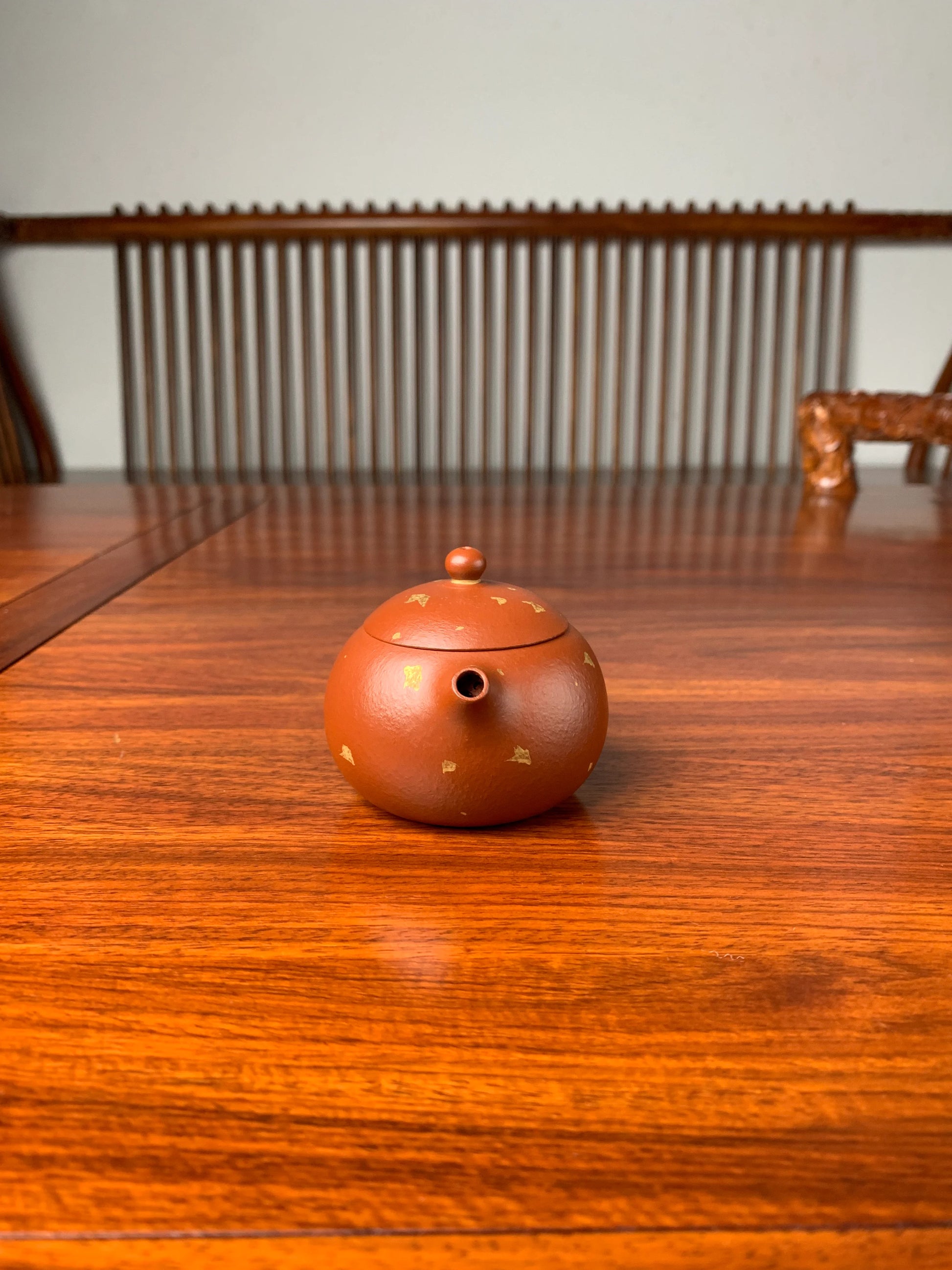xishi yixing teapot on the table front view