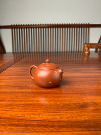 xishi yixing teapot on the table left view
