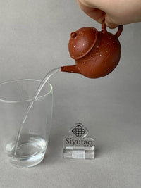 the perfect pour of the yi shing teapot