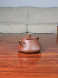 Right view of yi shing teapot shi piao handmade with yixing zisha