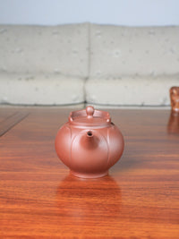 left view of the yi shing teapot monk's hat