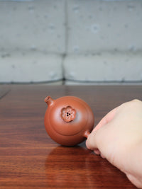 top view of yi shing teapot named flower on the table