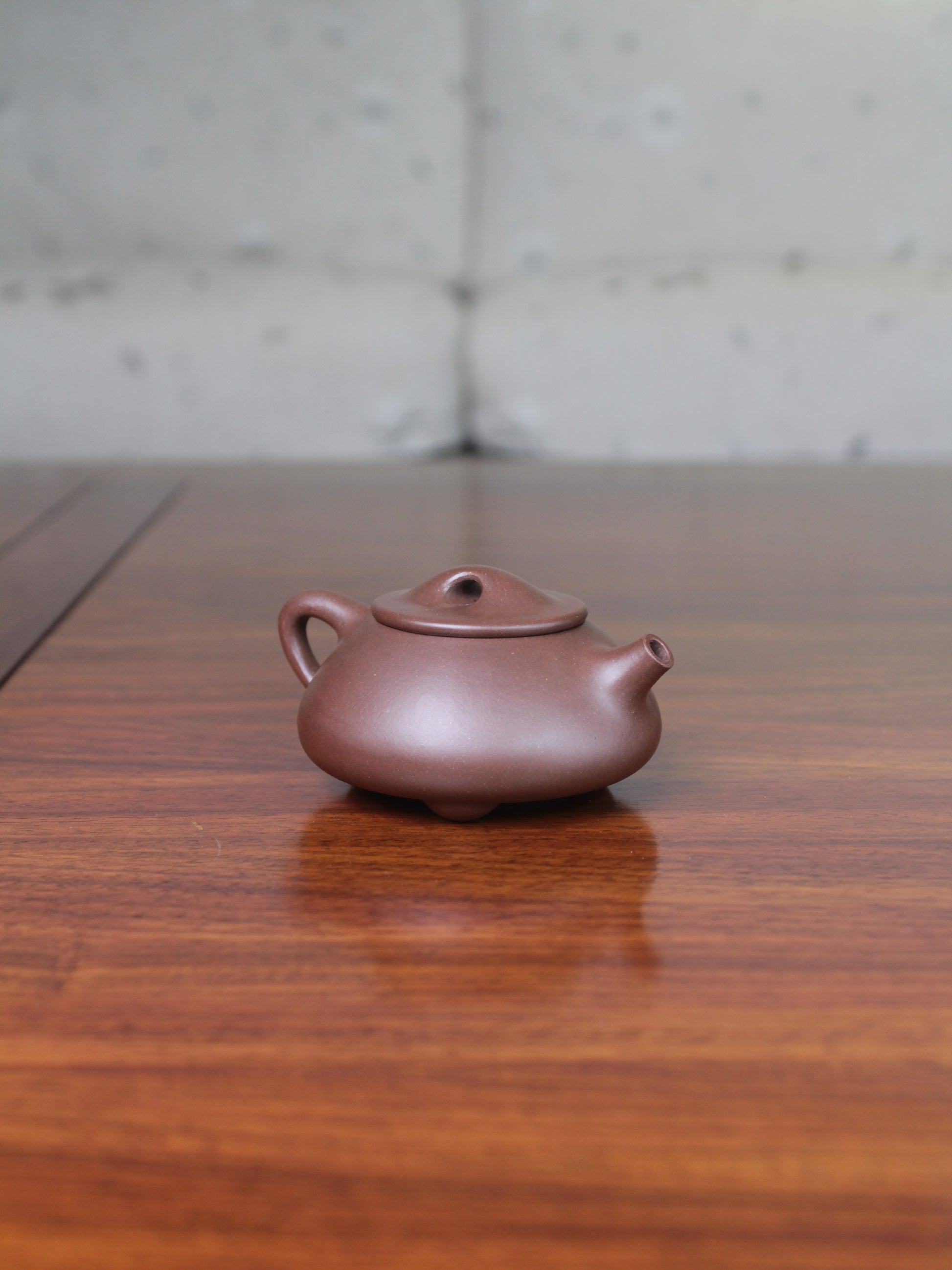 Left view of Yi sing teapot shi piao fully handmade by teapot artist