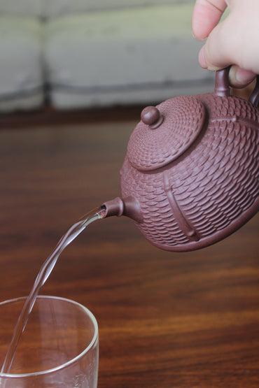 The yi xing tea pot pour