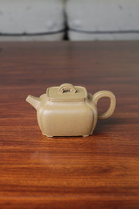yi xing tea pot handmade with purple clay on the table
