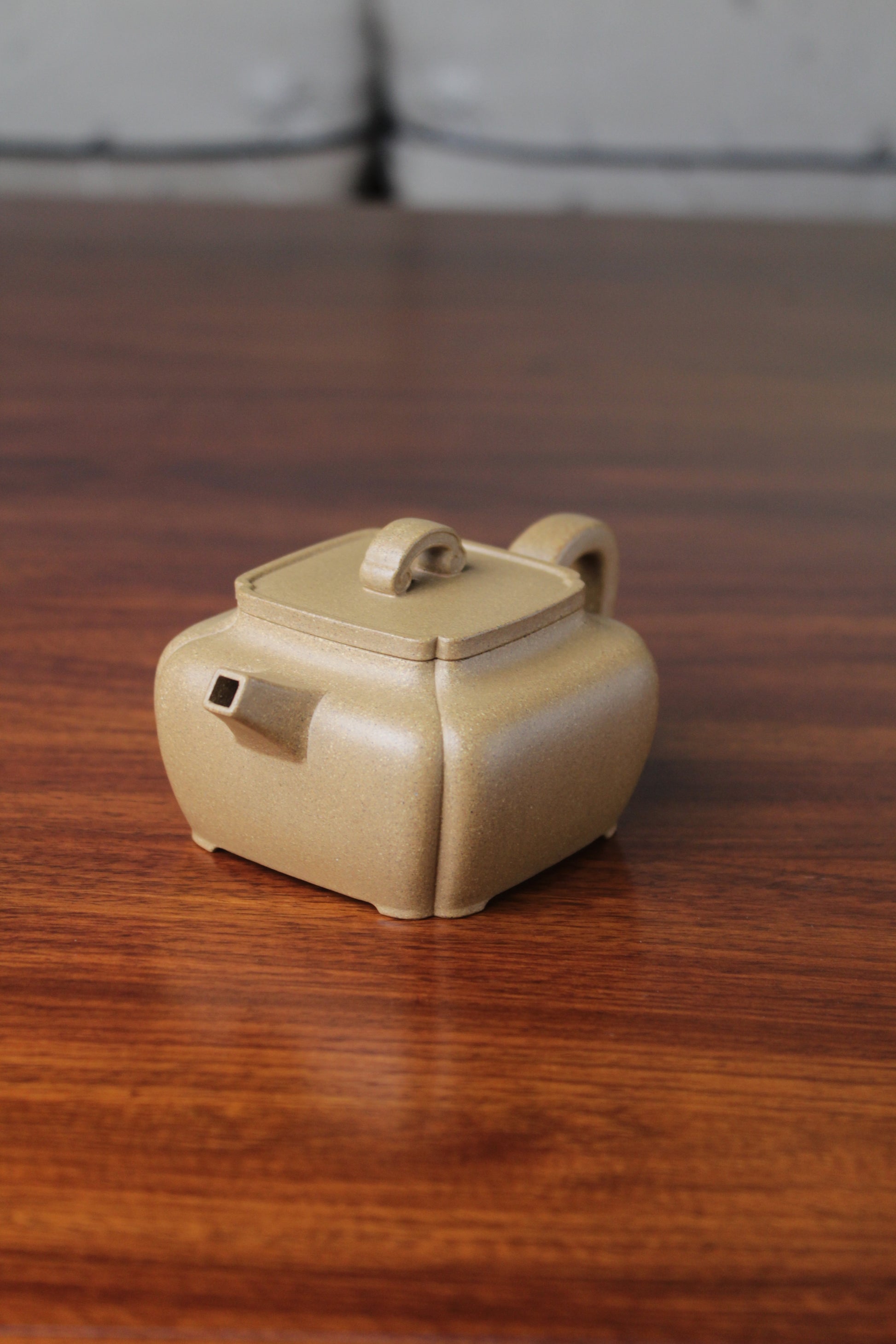 Right of the yi xing tea pot handmade with purple clay on the table