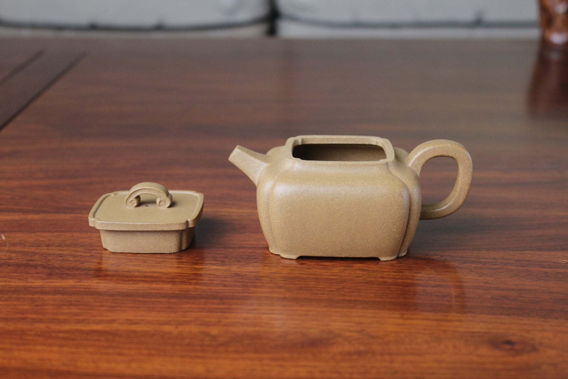 details of the yi xing tea pot handmade with purple clay on the table
