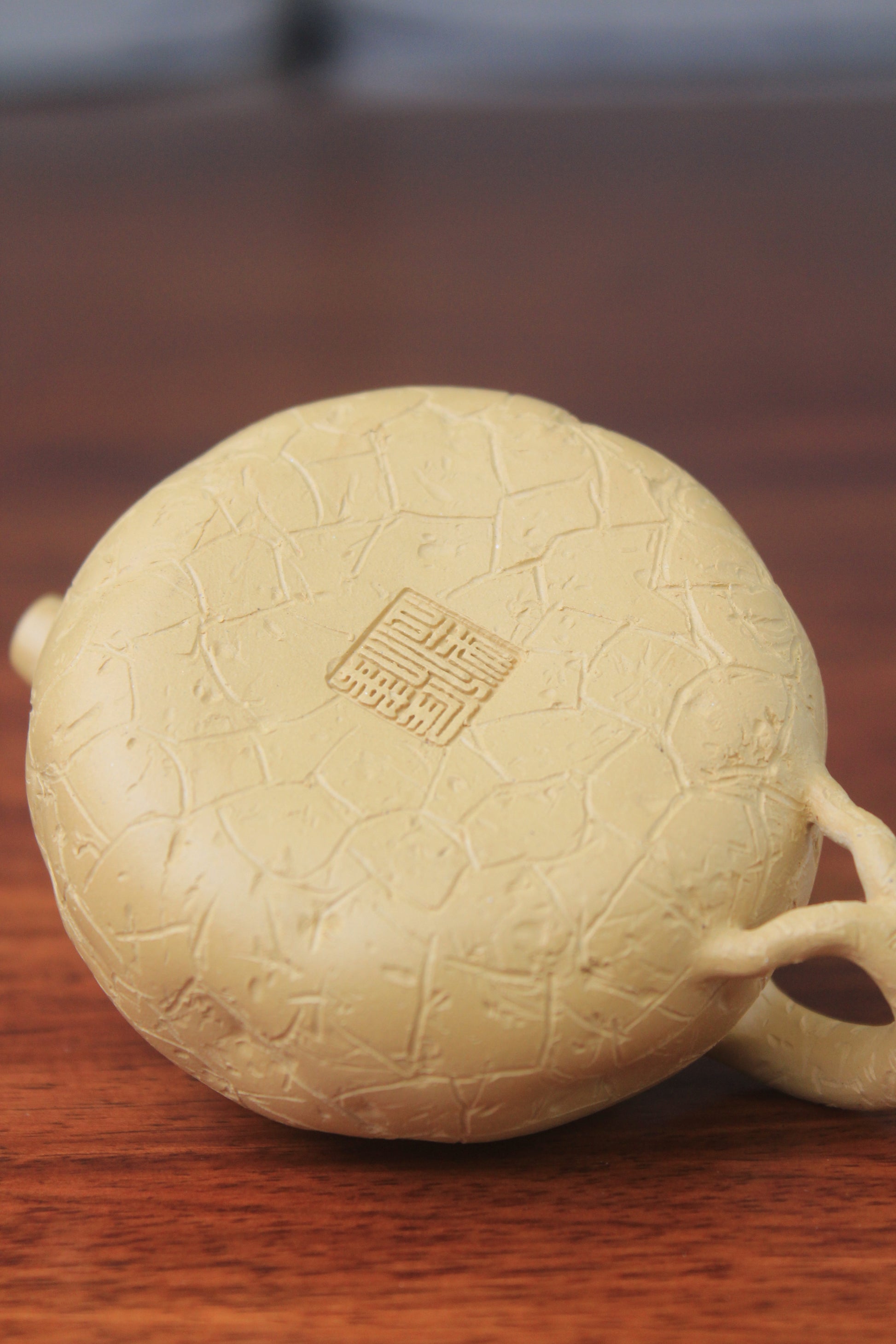 The mark of the yixing clay teapot on the table