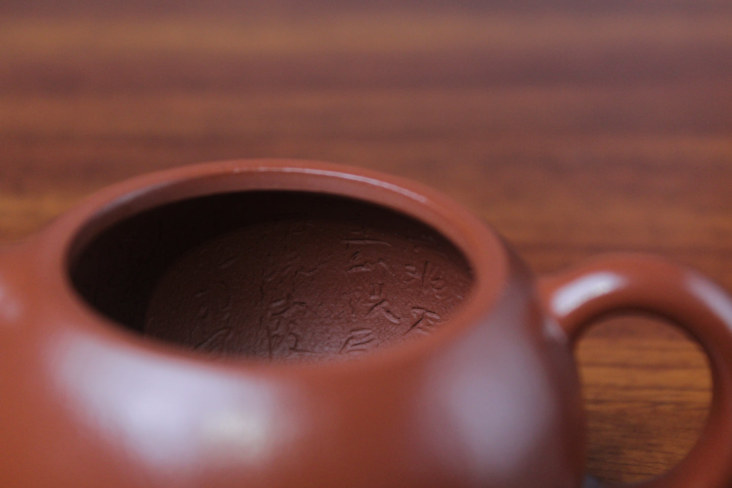 inside of the yixing clay teapot xishi on the table