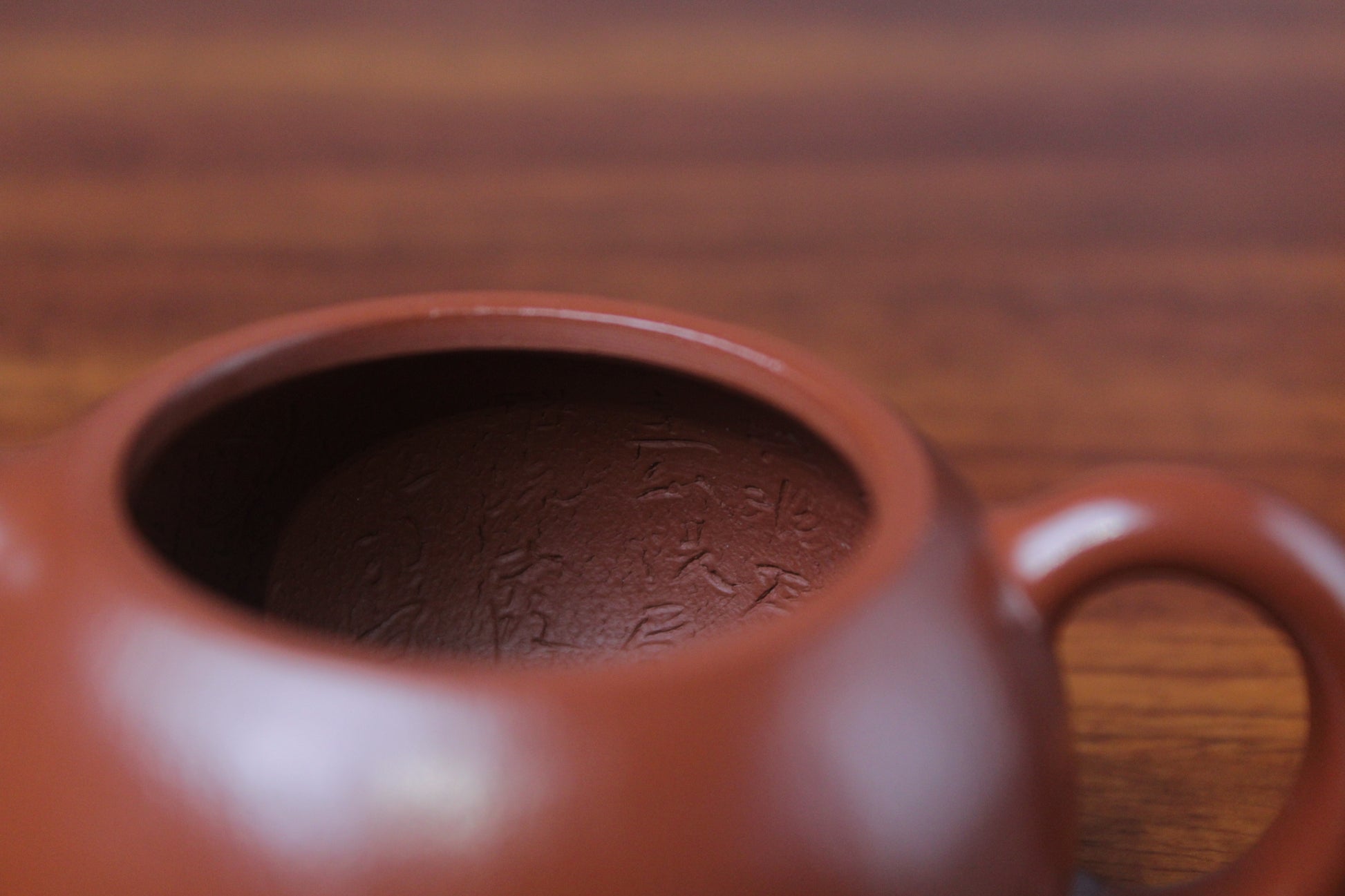 inside of the yixing clay teapot xishi on the table