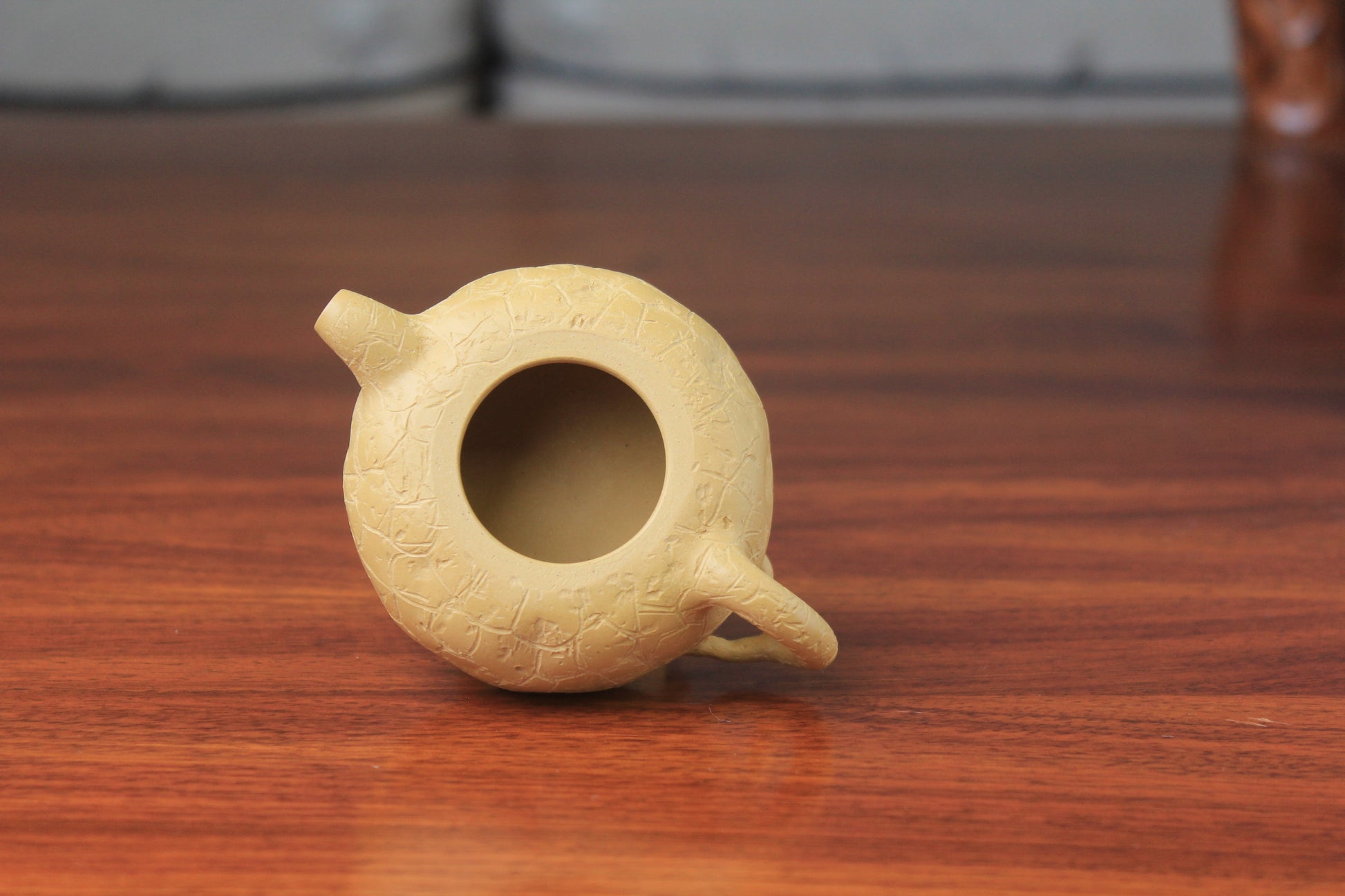 The detail of the yixing clay teapot on the table
