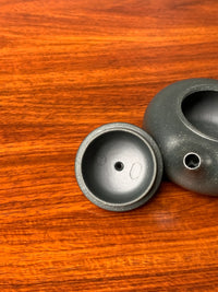a close look at the lid of the yixing clay teapot