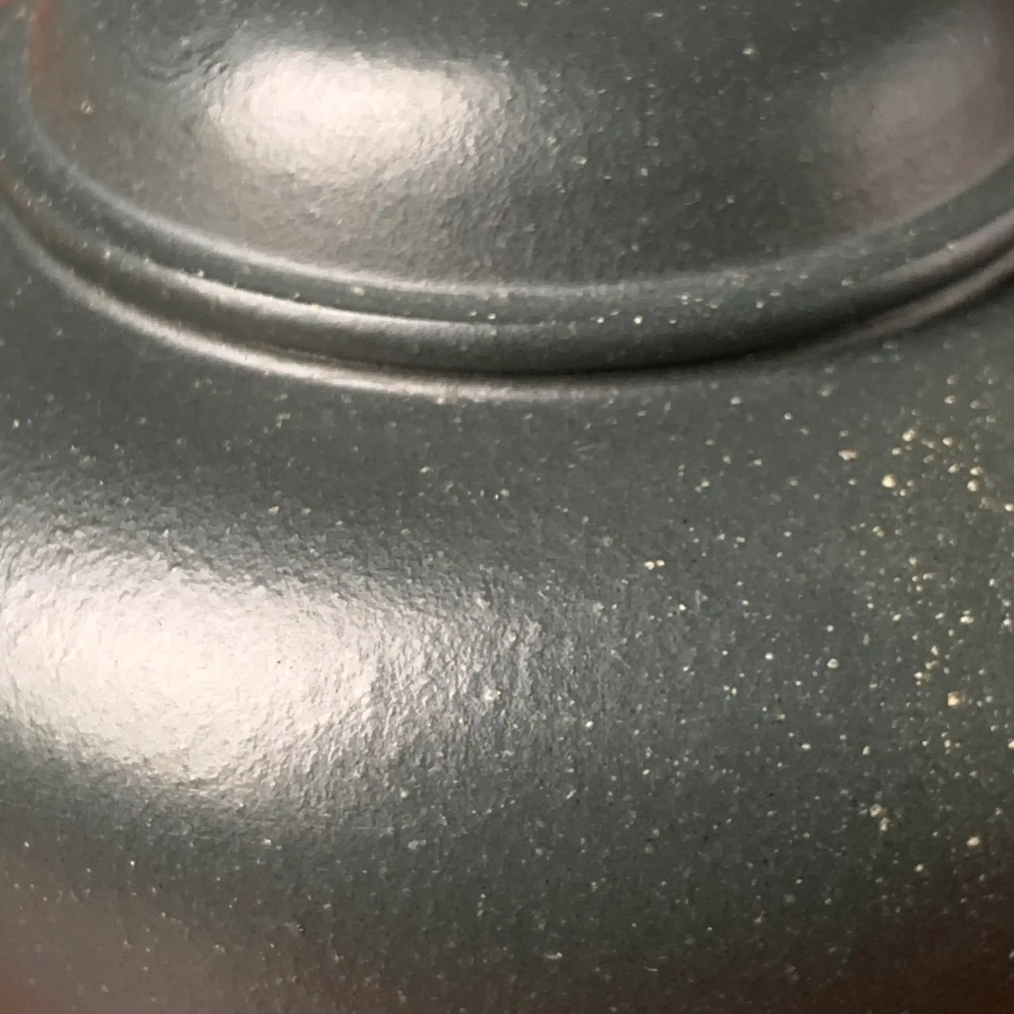 Take a closer look at the min guo lv ni yixing clay particles