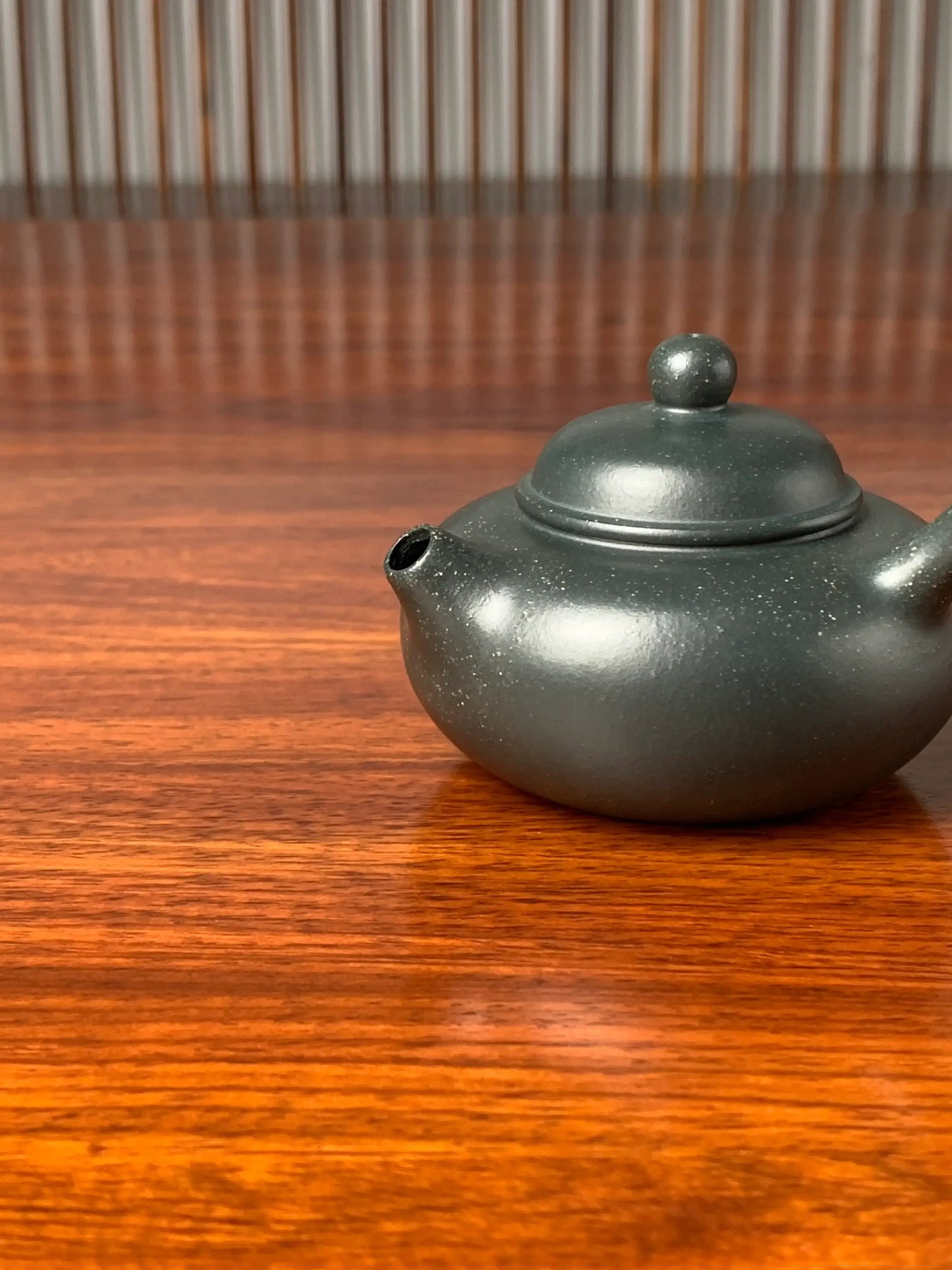 the spout of the yixing clay teapot tang yu